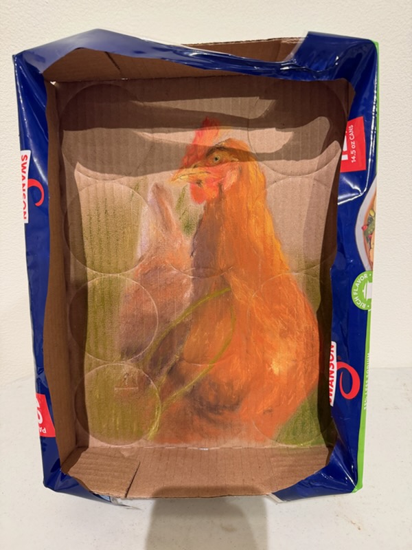 A painted portrait of a hen rendered on the interior of an open Swanson cardboard box